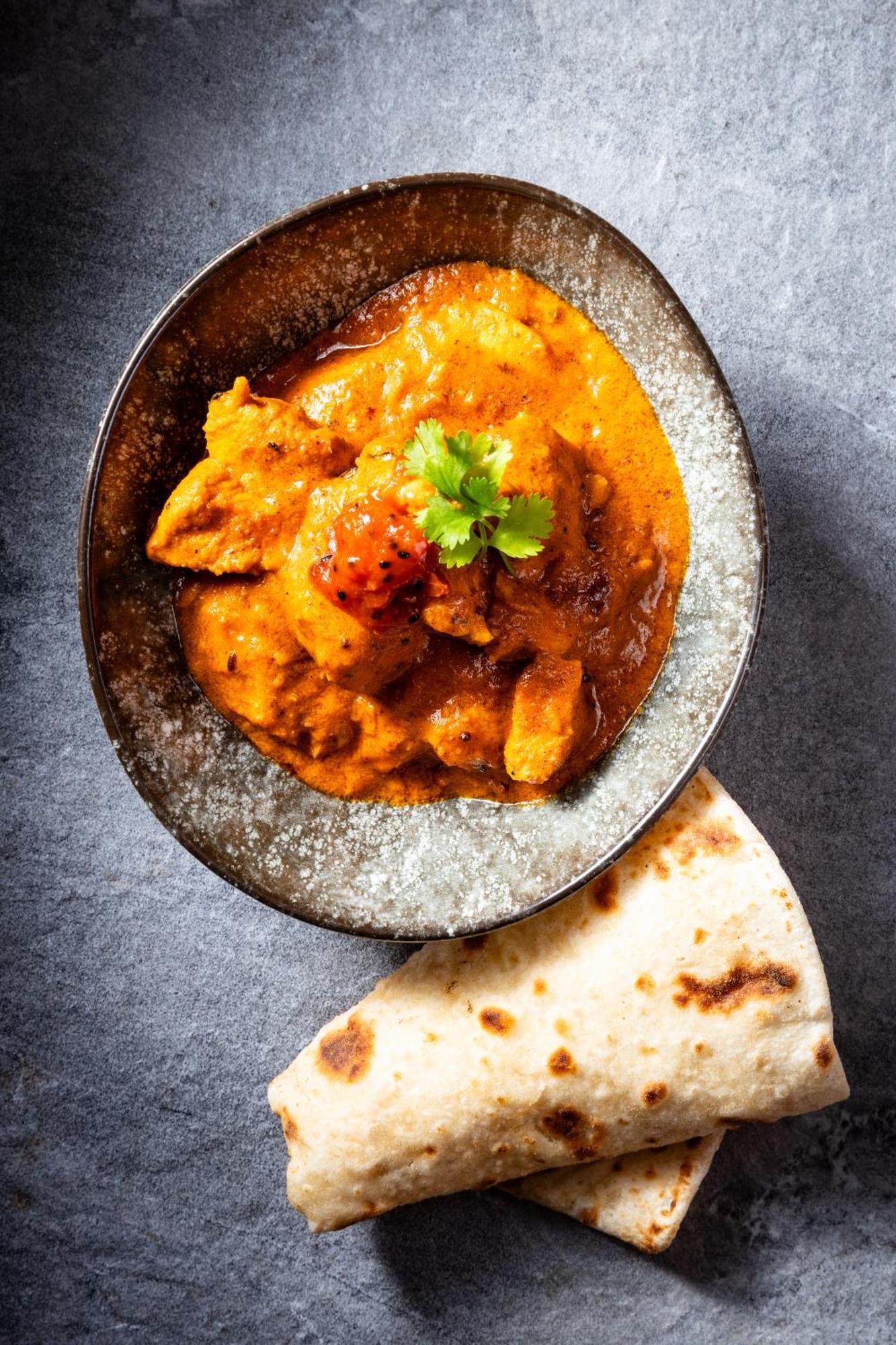 فندق تاج كيب تاون المظهر الخارجي الصورة A plate of chicken tikka masala